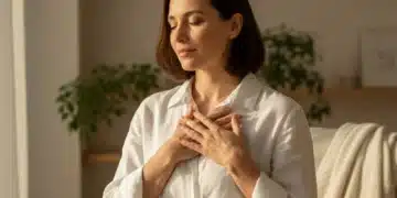 Person practicing self-compassion meditation, finding inner peace.